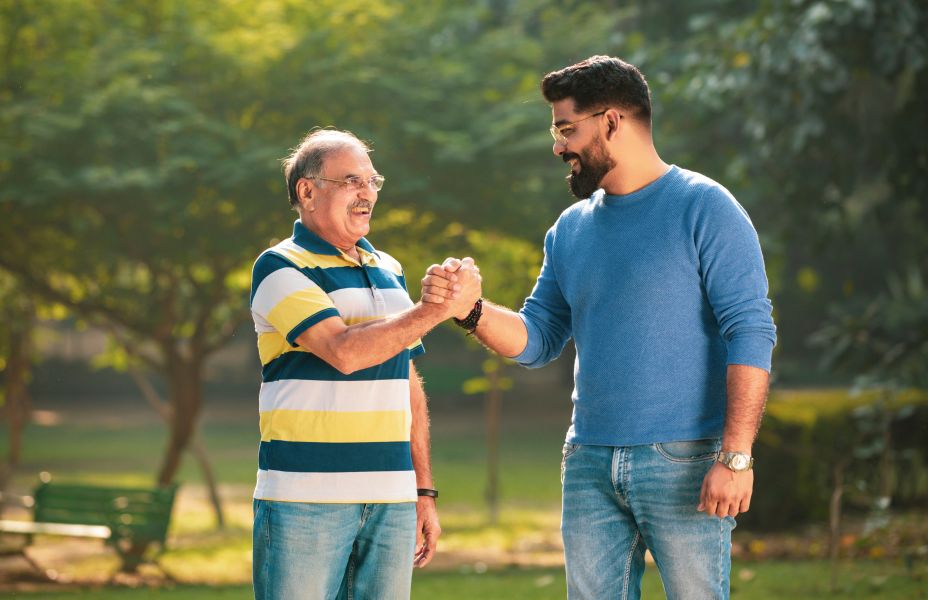 two males outdoors in a park
